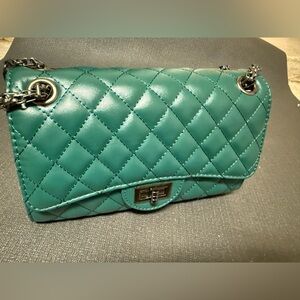 Adorable, dark green bag/purse with metal strap